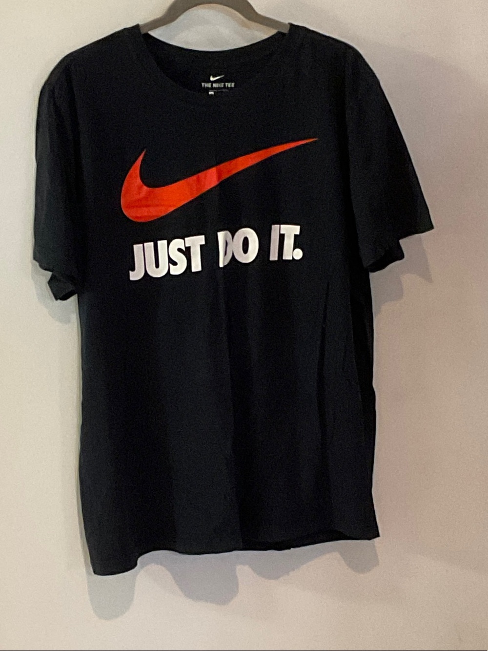 Nike Black Short Sleeve Tee with Red Swoosh and White 'Just Do It.' Text